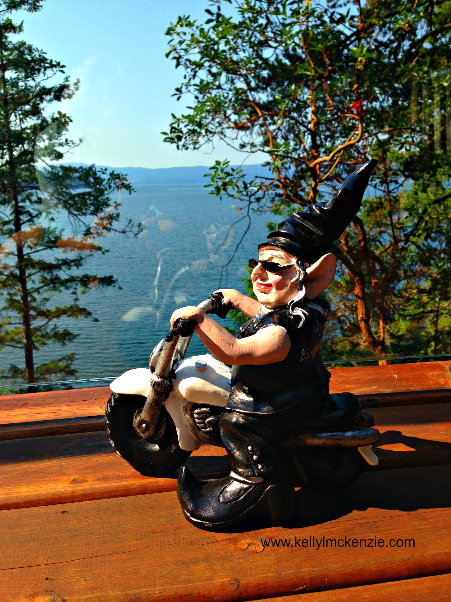 gnome statue in black leather on motorbike