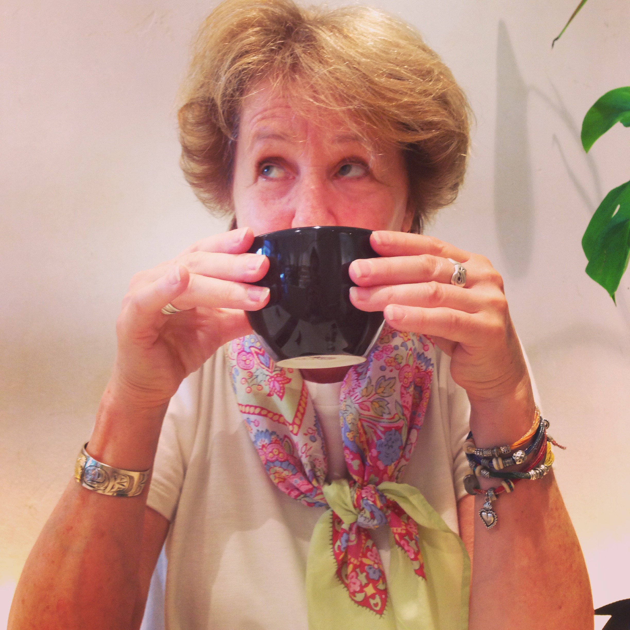 ALT="woman drinking coffee in Germany"