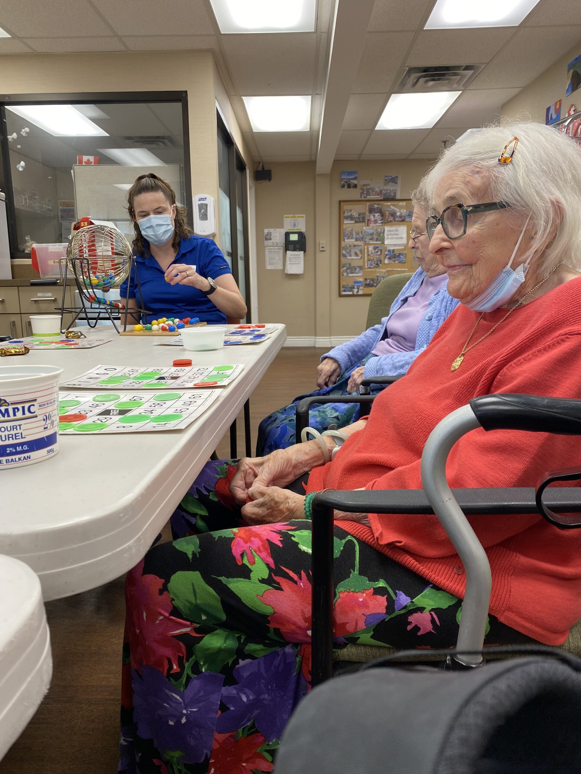 Bingo caller and bingo players during a game