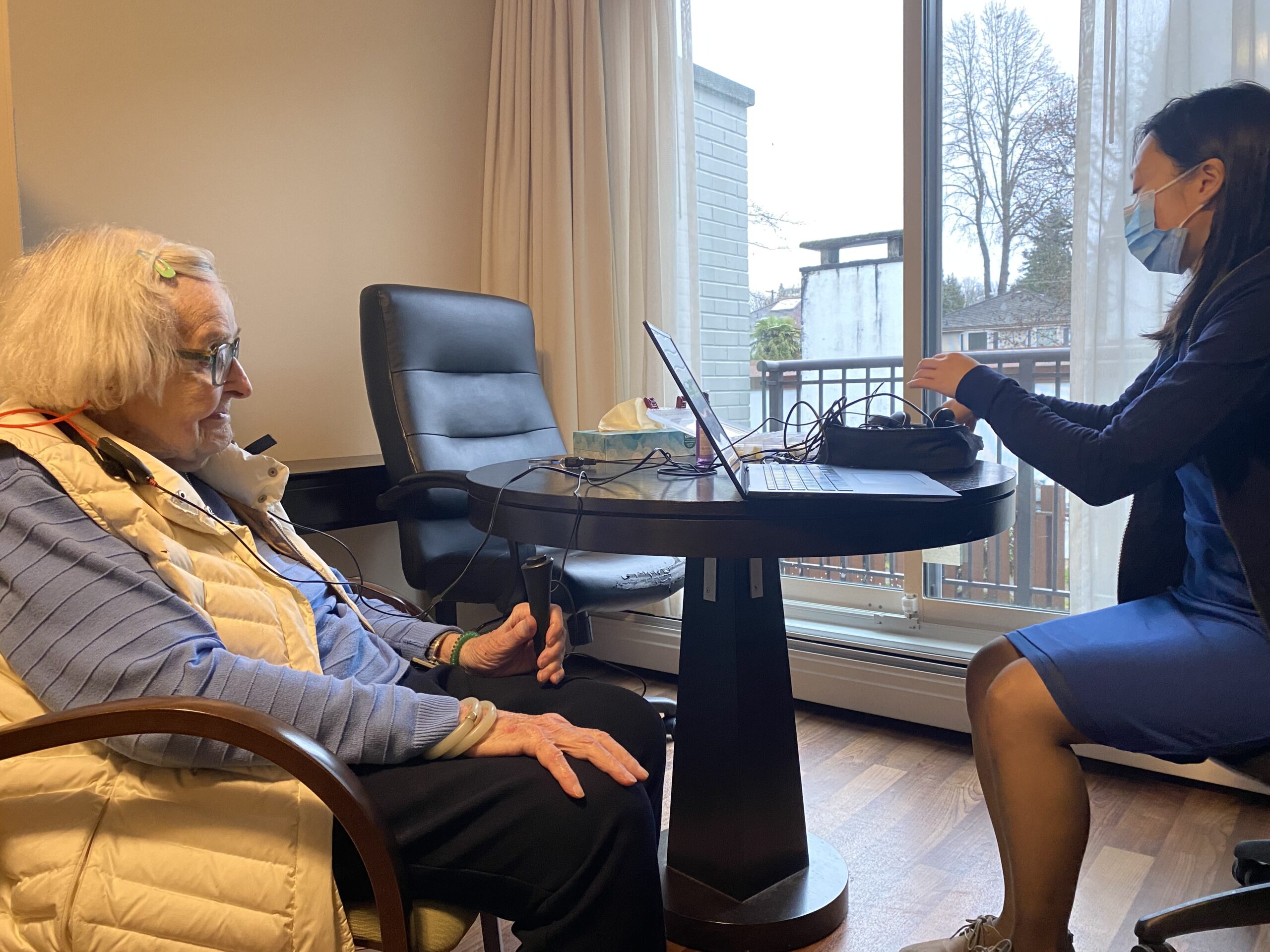 elderly woman gets hearing test