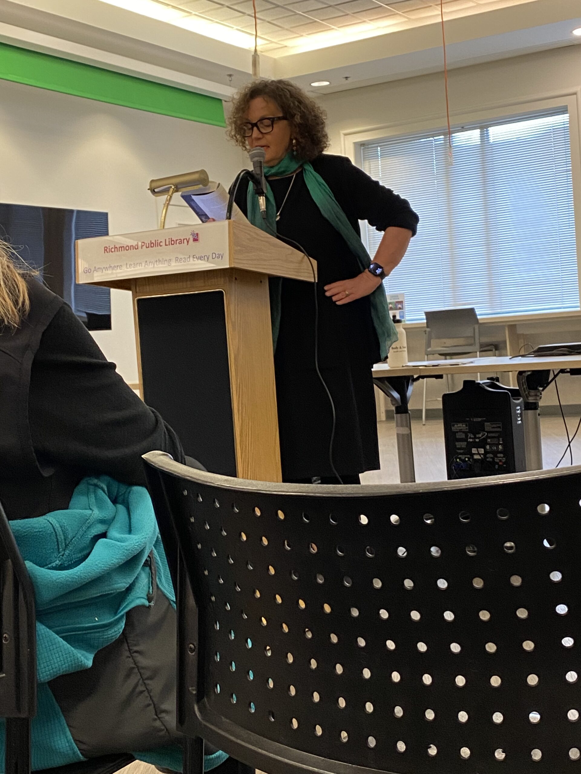 female author reading from her book