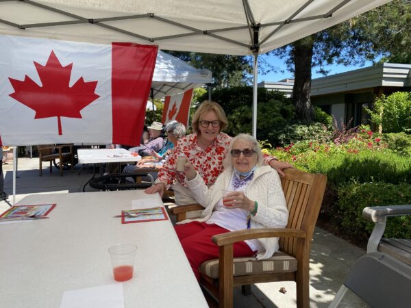middle-age and elderly women with Canadian flags