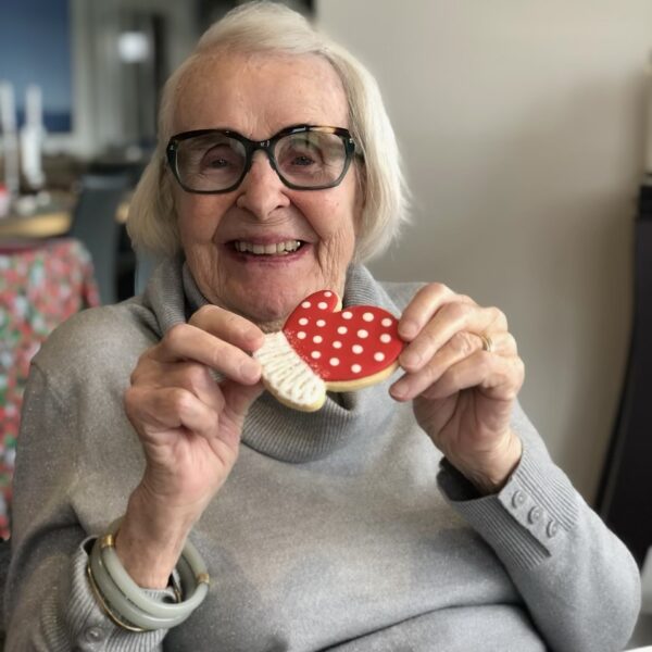 Elderly lady with red mitten sugar cookie